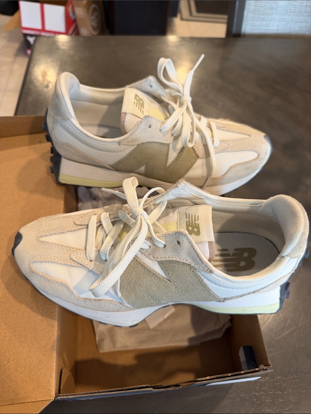 New Balance Womenโs Beige and White Suede Mesh Sneakers